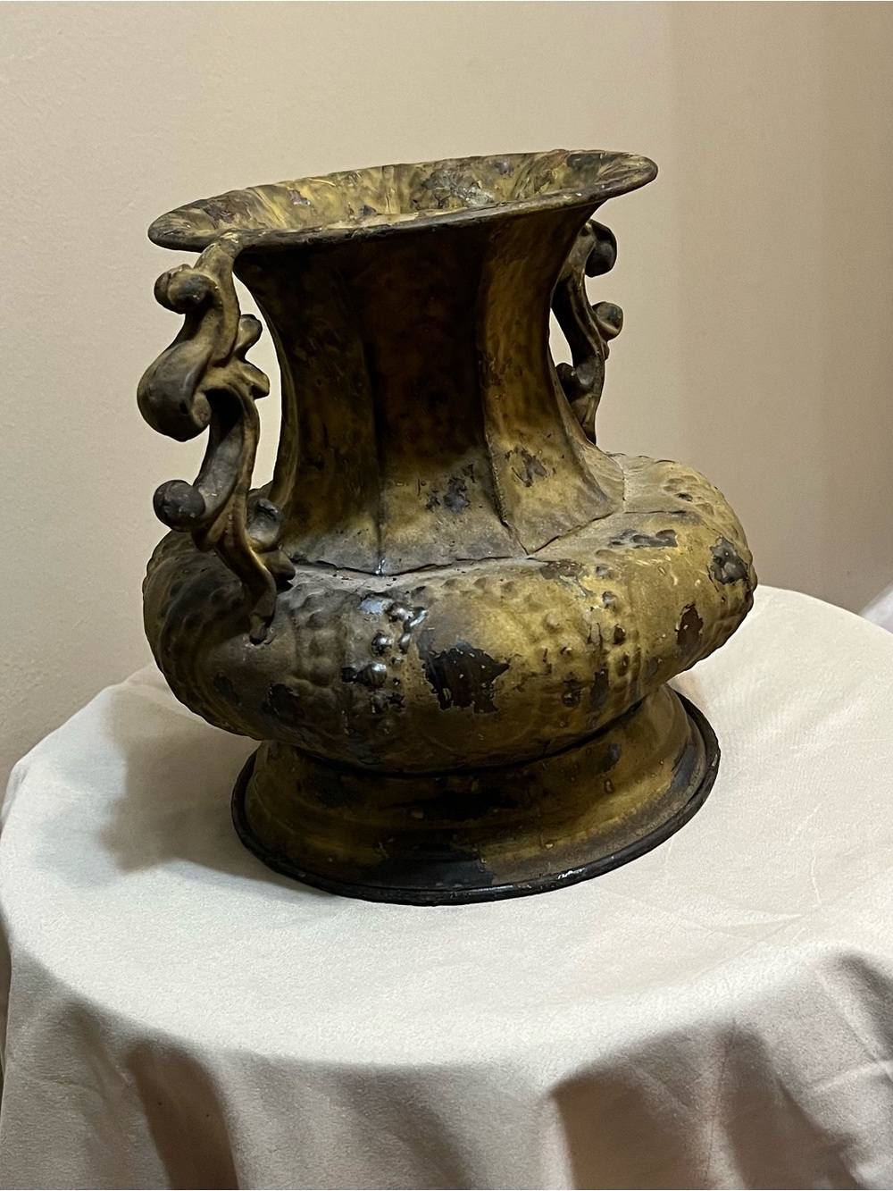 Antique Brass-Tone Urn with Ornate Curled Handles in Gold and Black